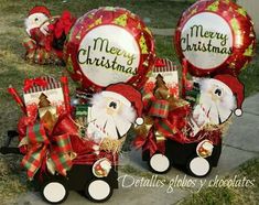 christmas decorations with santa clause on them and gifts in the wagon for children's birthday