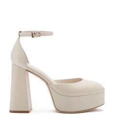 Ari Pump In Ivory Leather White Leather Ankle Strap Heels, White Leather Heels With Ankle Strap, Chic Cream Chunky Platform Heels, Beige Leather Chunky Platform Heels, Luxury Cream Platform Heels, Chic White Faux Leather Heels, Modern Cream Platform Heels, White Ankle Strap Heels In Faux Leather, Chic White Leather Heels