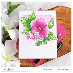 a card with flowers on it and the word hello written in large letters, surrounded by other cards