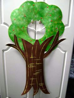 a door decorated with a paper tree