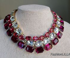 anna wintour necklace, Austrian crystal collet, fuchsia large octagon Georgian Paste riviere, rose pink oval necklace, statement necklace This group of individual necklaces are truly a la Anna Wintour style. clear ,fuchsia large octagon and rose pink oval crystals make them a true statement combination.  You can wear them individually all together, mix and match to accentuate your wardrobe. They can be ordered at a variety of lengths to create a unique combination every time you wear them.    Yo Anna Wintour Style, Large Pearl Necklace, Rhinestone Costumes, Oval Necklace, Anna Wintour, White Necklace, Necklace Statement, Austrian Crystal, Rose Pink