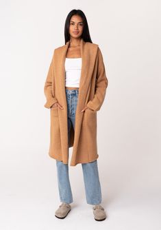 The sweater coat of your dreams is back! Like a heavy blanket with arms but way more flattering, this oversized sweater coat with a buttery soft, slouchy feel is exactly what you need to seamlessly transition to cooler weather. This ultra-cozy boho sweater coat doubles as a loungewear housecoat, or wear it over your date night dress for a casual, cozy look. Oversize fit Long duster length Shawl collar neckline Oversize hood Cocoon style silhouette Deep side pockets Open front Model is 5'8, garme Blanket With Arms, Boho Sweater Coat, Oversized Sweater Coat, Boho Fashion Winter, Blanket Cardigan, Heavy Blanket, Heavy Sweaters, Boho Sweater, Sweater Collection