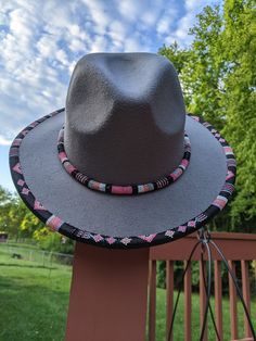 Beaded Fedora Hat Western Beaded Wide Brim Sun Hat, Beaded Fedora Sun Hat For Rodeo, Western Style Beaded Fedora Sun Hat, Beaded Cap Hats For Festivals, Festival Beaded Hat With Curved Brim, Festival Beaded Fedora Hat, Adjustable Brimmed Hats With Bead Caps, Beaded Fedora Hat For Festivals, Festival Fedora Hat With Beads