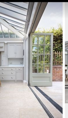 two pictures of a kitchen with white cupboards and an open door to the outside