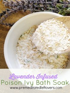 lavender flakes in a white bowl with a wooden spoon