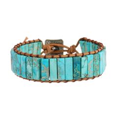 PRICES MAY VARY. Design：Turquoise Blue Jasper bracelet use alloy button for size adjustment.Handmade Real Brown Leather Interwoven with Brown Thread. Single Wrap Design: The 1-wrap design means that the bracelet is meant to be wrapped around the wrist once, offering a sleek and simple accessory that can easily complement your daily style. Imperial Jasper's Striking Beauty: Imperial Jasper is a visually captivating gemstone with intricate patterns and vibrant colors. When combined with the 7 Chak Cheap Bracelets, Beaded Leather Wraps, Boho Handmade, Imperial Jasper, Ashes Jewelry, Jasper Bracelet, Stone Healing, Beaded Wrap Bracelets, 7 Chakra