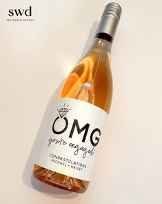 there is a bottle of wine with an orange on the label that says omg