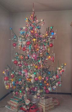 a christmas tree with many ornaments on it