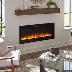 a living room filled with furniture and a fire place in the middle of the room