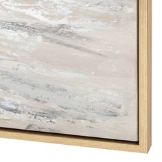 an abstract painting with white and grey colors on the canvas, framed in wood frame