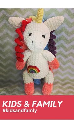 a crocheted stuffed animal with a rainbow on it's head and the words kids & family written below