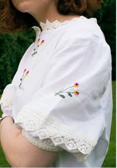 Found this beautiful fabric in London. It's a lightweight 100% cotton made in London. We love the soft hand-loomed cotton and the imperfections from hand-printing on the collar. Hand-embroidery made on collar and sleeves. Embroidered Tops With Relaxed Fit, Collared Blouse With Floral Embroidery For Daywear, Floral Embroidery Collar Blouse For Daywear, Daywear Blouse With Floral Embroidery And Collar, Floral Embroidered Collar Blouse For Daywear, Floral Embroidery Blouse With Collar For Daywear, Folk Style Linen Top With Floral Embroidery, Spring Cotton Embroidered Sleeve Top, Embroidered Cotton Collar Tops