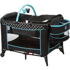 a baby crib that is black and blue