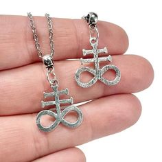 Ready for an epic shopping spree? Silver Leviathan Cross Necklace, Leviathan Cross Pendant, Occult Symbols, Brimstone Jewelry, Holiday Gift Father's Day, at a mind-blowing price of $20.00 Don't wait!
#SatanicCharms #LeviathanCross #SigilEarrings #OccultJewelry #SatanicNecklace #FallenAngelSymbol #PaganismWitchcraft #LuciferianJewelry #WiccanJewelry #OccultGiftIdea Metal Charm Necklaces With Cross Pendant For Gift, Spiritual Silver Cross Charm Necklaces, Silver Cross Charm Necklace For Spiritual Style, Spiritual Silver Cross Charm Necklace, Satanic Necklace, Leviathan Cross, Occult Symbols, Wiccan Jewelry, Jewelry Holiday