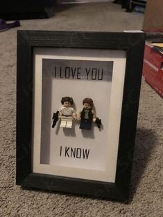 two legos in a frame with the words i love you know