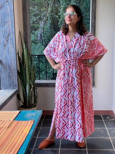 I made this caftan dress from a beautiful chevron pattern with a nice border and is available in many colors. I used the softest mulmul cotton fabric to make this. It is extremely soft and it gets softer with every wash. It is so free flowing, that it will make you feel as if you aren't wearing anything at all ;) The beauty of the Kaftans is they will fit everyone so no need to worry about the size et all. All my Kaftans have deep necks(11-12 inches) so will fit all head sizes. However, the length of my kaftans will vary. I make them according to your height and in both knee and ankle length option. It has a drawstring at the waistline. In the pictures, I have shown when it is relaxed and when I have tightened the drawstring. Please note there might be slight color variation due to lightin Pink Short Sleeve Kaftan For Beachwear, Pink Short Sleeve Beachwear Kaftan, Pink Short Sleeve Kaftan, Pink Printed Short Sleeve Kaftan, Beach Kaftan With Ikat Print And Kimono Sleeves, Ikat Print Kaftan With Kimono Sleeves For Beach, Summer Ikat Print Kaftan For Beach, Beach Ikat Print Maxi Kaftan, Long Ikat Print Kaftan For The Beach