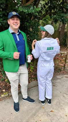 a man and woman dressed up in costumes