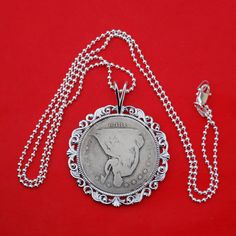 "You are looking at a gorgeous solid 925 sterling silver necklace with an authentic US 1862 Seated Liberty Half Dollar 90% Silver Coin, showing REVERSE in front - a majestic American flying bald eagle. The coin is in great condition with nice details, set with backside 4-prong, and you can see both sides of the coin. The pendant is made of solid 925 sterling silver, 1.95\"(50 mm) x 1.60\"(40 mm), and heavy. It comes with a 24\" solid 925 sterling silver chain, and also a gift box. I hope you end Silver Coin-shaped Medallion Necklace, Silver Nickel-free Coin Necklace, Nickel-free Silver Medallion Coin Necklace, Nickel-free Sterling Silver Medallion Coin Necklace, Silver Sterling Silver Coin Necklace, Tarnish Resistant, Half Dollar, Silver Coin, 925 Sterling Silver Chain, Silver Coins