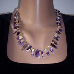 This is a beautiful necklace of beaded genuine amethyst, raw citrine beads, Japanese seed beads and Czech seed beads. The necklace is about 49.5 cm (19.5) including clasp + 2” extender chain. Beads threaded onto high quality Beadalon bead stringing wire. Keep in mind, please, a necklace may Bohemian Amethyst Gemstone Beads Crystal Necklaces, Bohemian Amethyst Gemstone Bead Crystal Necklace, Bohemian Amethyst Gemstone Beaded Crystal Necklace, Bohemian Amethyst Gemstone Beaded Necklace, Purple Bohemian Crystal Necklaces With Natural Stones, Bohemian Amethyst Necklace In Purple, Bohemian Purple Gemstone Crystal Necklace, Bohemian Purple Crystal Necklaces, Bohemian Amethyst Purple Necklace