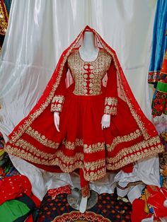 afghan kuchi traditional wedding drees is made of good quality long lasting fabric. Traditionally such Afghanistan Persian Pashtun new design frocks are used as bridal dress. Most of girls also like and recommend such dresses for wedding, Nikkah and Mehndi night events. The dress measurements are kept average. If you need this frock in exact measurements , then please send us measurements which best fit on your body Traditional Shantoon Wear With Dabka For Ceremonies, Anarkali Style Ceremonial Sharara With Dabka Work, Shantoon Traditional Wear With Dabka For Ceremonies, Anarkali Style Sharara With Dabka Work For Ceremonial Occasions, Anarkali Gown With Mirror Work For Traditional Ceremonies, Ceremonial Anarkali Dress With Dupatta, Fitted Anarkali Dress In Nida Fabric, Fitted Anarkali Nida Dress, Fitted Anarkali Dress In Nida