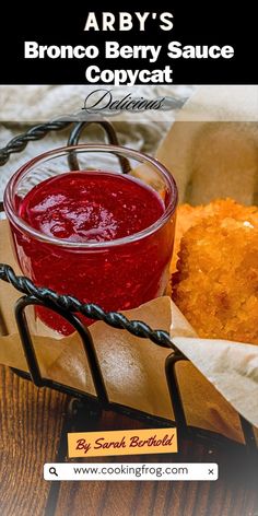 broccoli and beet sauce in a glass bowl on top of a wooden table