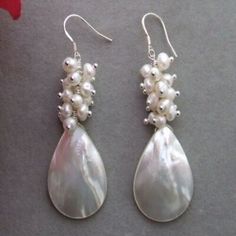 ad eBay - Find many great new & used options and get the best deals for White Pearl Shell Earrings Sterling Silver Bridal Handmade Anniversary Dangle at the best online prices at eBay! Free shipping for many products! Handmade Pearl Chandelier Earrings, Handmade Dangle Bridal Earrings, Elegant Silver Beaded Teardrop Earrings, Elegant Sterling Silver Teardrop Earrings With Dangling Beads, White Teardrop Dangle Earrings For Anniversary, Handmade White Teardrop Earrings For Party, Handmade White Chandelier Earrings For Anniversary, Handmade Teardrop Chandelier Earrings For Anniversary, Handmade White Long Drop Teardrop Earrings