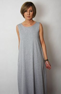 Cotton maxi dress with pockets on the sides and a neckline at the back. Perfect not only for summer :) Size (total length / bust) US --- UK --- EU/DE 4 ----- 6 ----- 34/XS (138/84) 6 ----- 8 ----- 36/S (138/88) 8 ----- 10 --- 38/M (139/92) 10 ---- 12 --- 40/L (140/96) 12 ---- 14 --- 42/XL (140/100) dimensions in cm. 100% cotton. Production methodsewn - own machinery - production in Poland by the Sisters Textile100% cotton, weight 180g/m2 Casual Summer Maxi Dress For Everyday, Casual Sleeveless Relaxed Fit Maxi Dress, Casual Relaxed Fit Sleeveless Maxi Dress, Sleeveless Maxi Dress With Side Slits For Daywear, Summer Cotton Sleeveless Maxi Dress, Cotton Sleeveless Maxi Dress For Summer, Sleeveless Relaxed Fit Maxi Sundress, Summer Sleeveless Cotton Maxi Dress, Relaxed Fit Sleeveless Maxi Dress For Summer