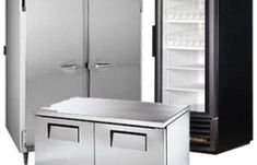 three stainless steel refrigerators and two freezers are shown in this image with the door open