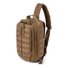 the back pack is tan and has multiple compartments