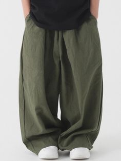 These premium kids' balloon pants are crafted from a bio-washed blend of 55% linen and 45% cotton, offering both durability and breathability perfect for growing children. The comfortable elastic waistband and thoughtfully designed vertical darts create a flattering tapered silhouette while maintaining a relaxed fit throughout. Available in black, beige, and khaki across sizes J1-J4 (fitting heights 110-150cm), these Korean-made pants feature high-quality construction verified by KATRI testing a Monk Pants, Balloon Pants, Buddhist Monk, Kids Pants, Fall 2024, Bottom Clothes, Bottoms Pants, Business Casual, Balloons