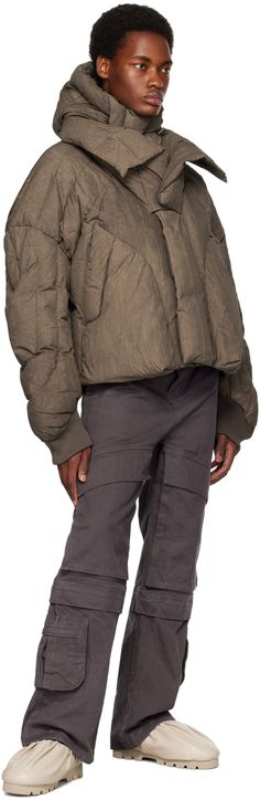 Down-filled quilted enzyme-washed nylon taffeta jacket. · Bungee-style drawstring at hood · Funnel neck · Zip closure with velcro placket · Velcro storm flap at front · Zip and welt pockets · Concealed bungee-style drawstring at hem · Rib knit cuffs · Zip pocket at interior · Fully lined Supplier color: Wood Fill: 90% duck down, 10% duck feather. Taffeta Jacket, Entire Studios, Duck Feather, Duck Down, Funnel Neck, Knit Cuff, Welt Pockets, Luxury Streetwear, Funnel