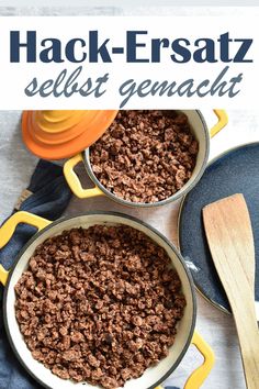 two pans filled with ground beef next to a wooden spoon