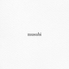 the word musubi written in black ink on white paper