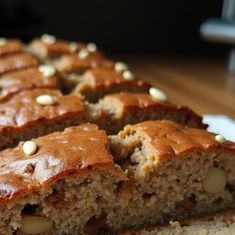 sliced loaf of cake sitting on top of a white plate