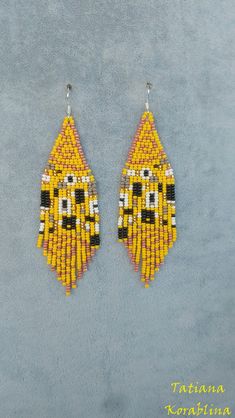 the beaded earrings are yellow and black