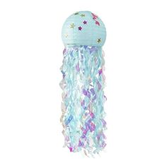 a blue and purple jellyfish with stars on it's head is hanging from the ceiling