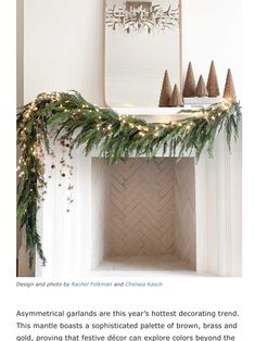 a fireplace mantle decorated with christmas garland and pine cones on top, surrounded by greenery