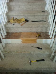 some tools that are laying on the stairs