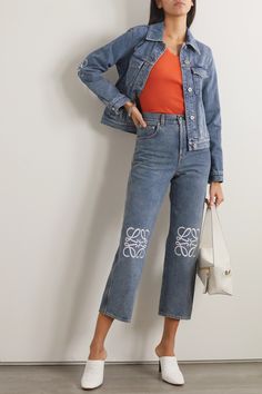 Loewe's jeans have a high-rise waist and classic straight-leg fit. The knees are appliquéd with the label's 'Anagram' motif, lazer cut from the same supple leather as the house's iconic handbags. Pair the cropped length with mules or ankle boots, alike. Designer Jeans With Five Pockets For Spring, Designer Spring Jeans With Five Pockets, Designer Straight Leg Denim Blue Jeans, Luxury Bottoms With Five Pockets, Luxury Straight Leg Jeans For Spring, Designer Denim Blue Bottoms, Designer Straight Leg Bottoms For Spring, Loewe Jeans, Iconic Handbags