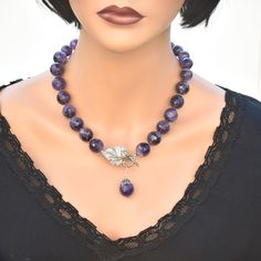 ♥ Ready to ship ♥ 100% handmade ♥ Packed in a gift box ♥ Custom length ♥ Ready to ship ♥ Genuine faceted amethyst 12 mm. Add a touch of bohemian elegance to your outfit with this stunning handmade amethyst lariat statement necklace.  Crafted with care and attention to detail, this unique piece features vibrant amethyst gemstones that dangle delicately to create a beautiful and eye-catching design. Statement of luxury & elegance! Multifaceted Amethyst beads play with the light creating amazing ef Gemstone Round Beads Jewelry Gift For Her, Elegant Gemstone Beads Jewelry As Gift For Her, Elegant Amethyst Gemstones For Gift, Elegant Amethyst Gemstones As A Gift, Purple Round Bead Gemstones For Gifts, Purple Polished Beads Jewelry Gift, Purple Gemstone Bead Pendant Jewelry, Purple Gemstone Beads Jewelry As Gift, Purple Pendant Jewelry With Gemstone Beads