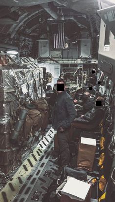 the inside of an airplane with people in it