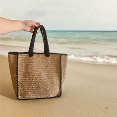 Embrace the summer vibes with our Handmade Straw Beach Bag, featuring elegant black striped.  Crafted with care, it is designed to be carried comfortably on the shoulder or by hand. Material: Eco-Friendly High-Quality paper yarn.  👙🏖️Perfect for beach outings, shopping trips, or daily use. Upgrade your summer style with this versatile and chic beach bag.  You can easily fit your personal items such as a towel, sunscreen, bikini, book, and magazine.  Get yours today and enjoy the perfect blend Large Capacity Square Beach Bag For Beach Season, Summer Beach Bag With Large Capacity, Summer Square Beach Bag With Large Capacity, Large Rectangular Beach Bag For Vacation, Summer Large Capacity Square Beach Bag, Large Capacity Square Summer Beach Bag, Large Capacity Square Beach Bag For Vacation, Chic Rectangular Beach Bag For Vacation, Large Capacity Rectangular Beach Bag For Vacation