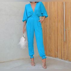 Blue Jumpsuit By Mbritz. 100% Viscose Made In Brazil Chic Light Blue V-neck Jumpsuit, Chic Blue Jumpsuit For Evening, Elegant Light Blue Jumpsuits And Rompers For Summer, Chic Blue Jumpsuits And Rompers For Evening, Light Blue V-neck Jumpsuit For Party, Elegant Blue V-neck Jumpsuits And Rompers, Chic Blue Jumpsuits And Rompers For Spring, Chic Light Blue V-neck Jumpsuits And Rompers, Elegant Light Blue Jumpsuits And Rompers For Party