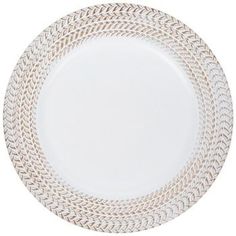 an empty white plate with braided edges