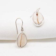 Cowrie Shell Earring, Handmade Earring, Natural Cowrie, Designer Earring, 925 Silver Earring, Cowrie Jewelry, Beautiful Earring, Gift Her All the jewelry made of 925 Sterling silver Handmade Jewelry We make the jewelry with lots of love 100% Quality Jewelry You will get well finished jewelry Shipping Details: We ship the order through Dhl, UPS shipping service which is track able. We accept the expedited shipping service. IF YOU HAVE ANY QUESTION PLEASE FEEL FREE TO ASK Pierced Teardrop Pearl Earrings In Sterling Silver, White Sterling Silver Plug Earrings As Gift, White Sterling Silver Earrings, White Sterling Silver Hoop Earrings As Gift, Sterling Silver White Gold Teardrop Earrings Gift, White Sterling Silver Earrings Stamped 925, White Gold Sterling Silver Teardrop Earrings Gift, White Gold Teardrop Earrings In Sterling Silver As Gift, Sterling Silver Pearl Earrings Gift