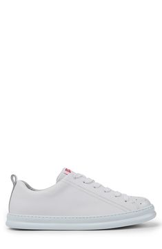 An interpretation of the iconic Runner from the '80s, this casual sneaker is outfitted with breathable perforations and lightweight cushioning. Removable OrthoLite® insole XL EXTRALIGHT® for lightness and shock absorption Leather upper/recycled textile lining/synthetic sole Imported Casual Sneakers, Converse Sneaker, Leather Upper, Converse, Nordstrom, Sneakers, Leather