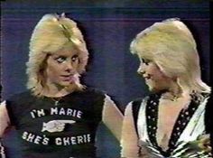 two women standing next to each other in front of a tv screen with the caption, i'm marie chees cher