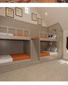 there are two bunk beds in this room and one has orange sheets on the bed