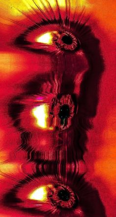 an abstract photograph with red and yellow colors in the background, including two large eyeballs