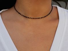 Beautiful choker featuring a black beaded onyx chain. Perfect choker for layering. Made with high quality materials making it water proof and hypoallergenic. Details: Choker necklace measure 14" in length Each necklace comes with an additional 2" adjustable extender chain Gold filled or stainless steel findings (Tarnish resistant and hypoallergenic) 3mm Black onyx beads Beautiful Chokers, Onyx Necklace, Tennis Necklace, Onyx Bead, Threader Earrings, Chain Gold, Water Proof, Snake Chain, Black Beads